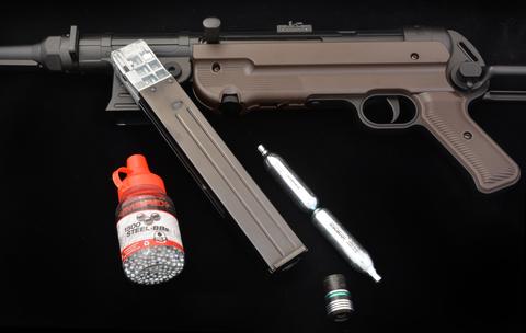 Legends MP airguns on a tabletop pictured with BB and 12 gram CO2